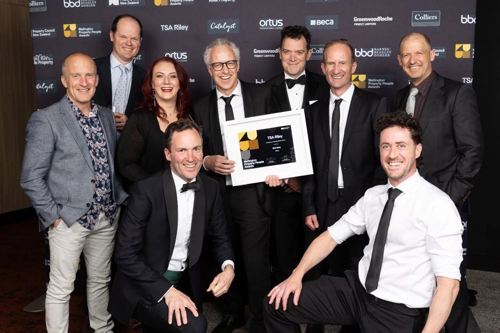 A group of people posing for a photo at the Property Council New Zealand Awards 2024